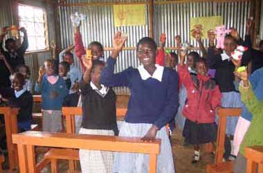 FKC children with gifts in class
